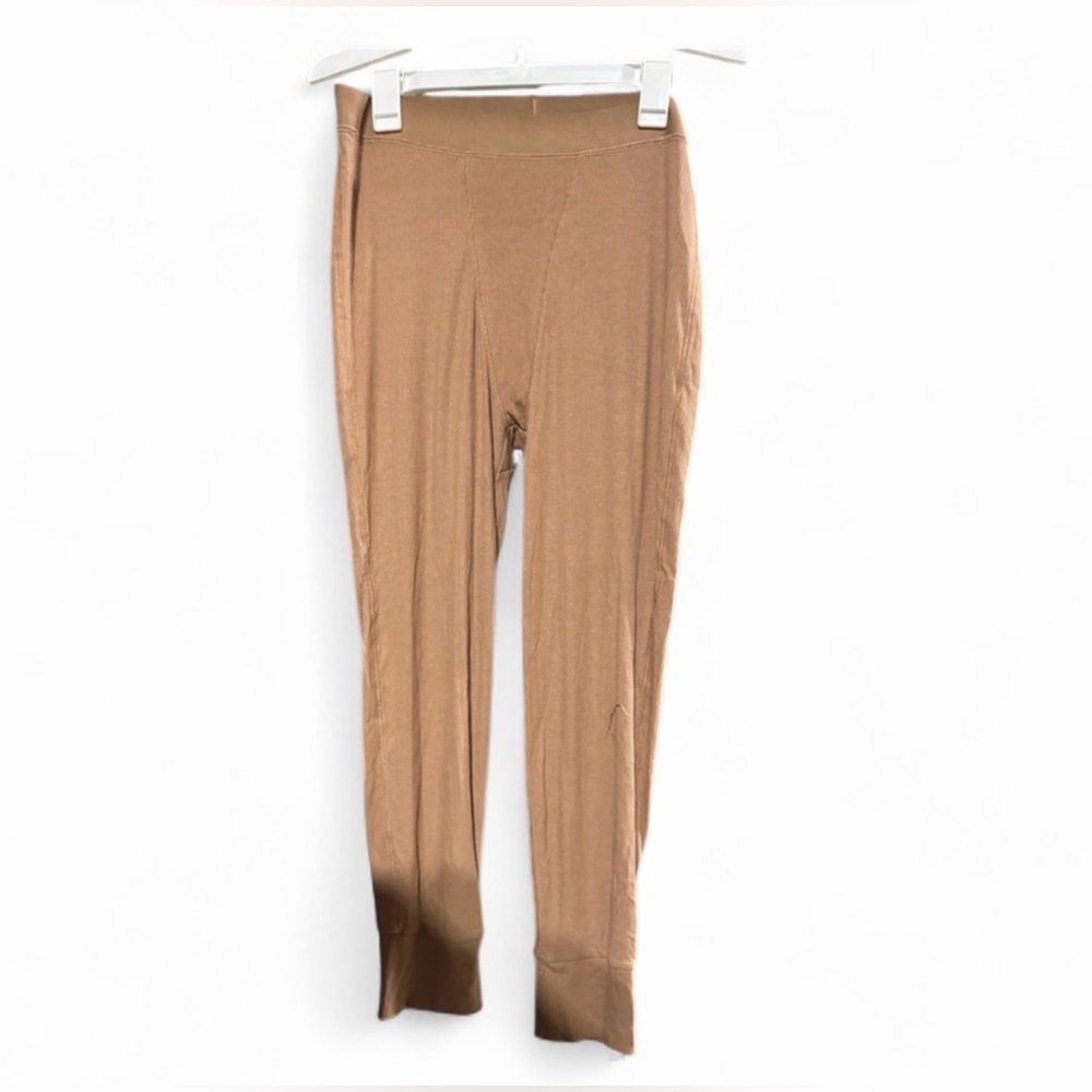 Size Large Stars Above Brown Pajama Pants